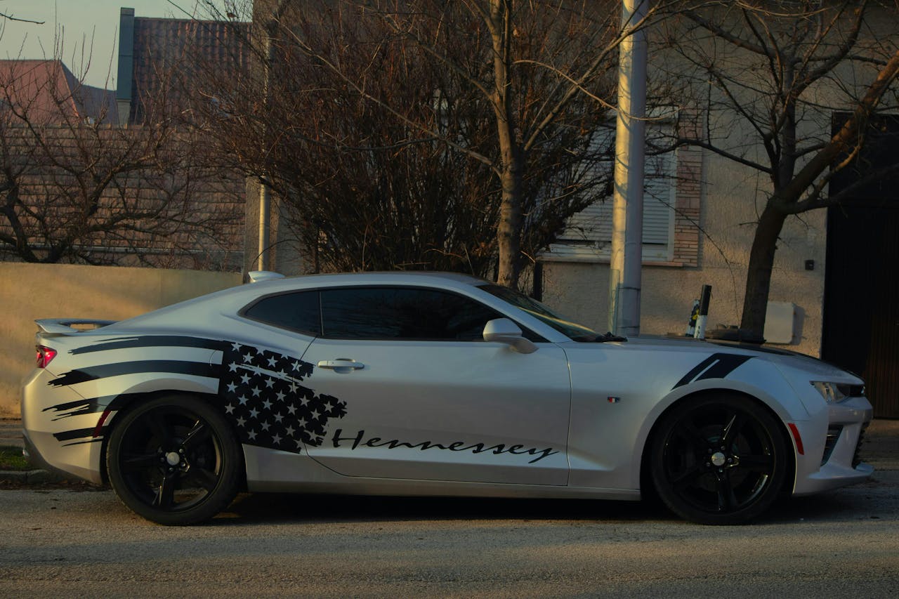 high-performance-car-with-american-flag-wrap-on-street-32875955